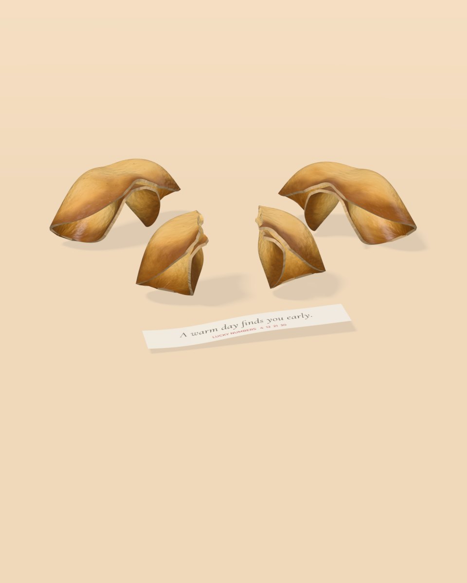 Fortune cookies, one broken open beside its paper slip
