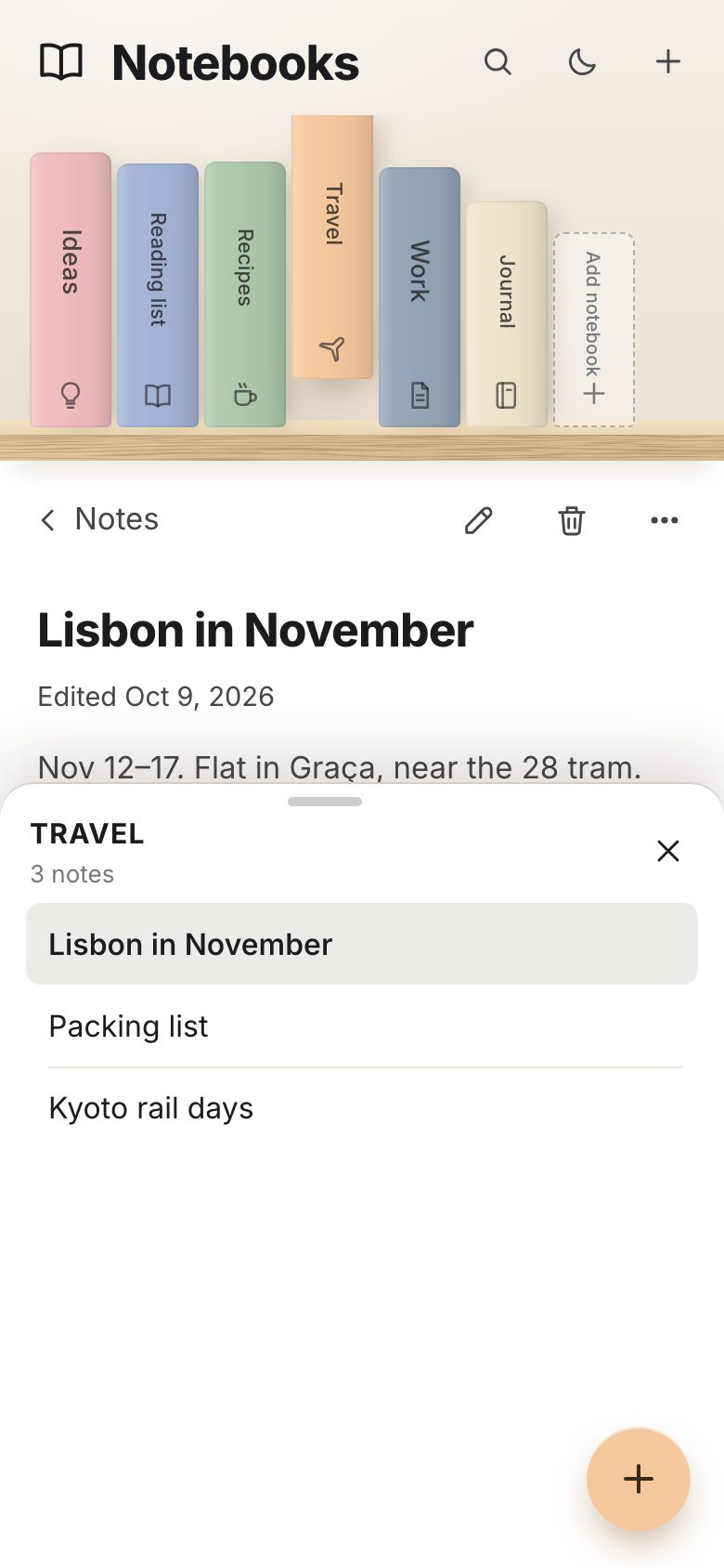 Nordic on a phone: pastel notebooks on a light-oak board under the header, Travel raised, the open note below and Travel's notes in a half-open sheet with a peach + button.