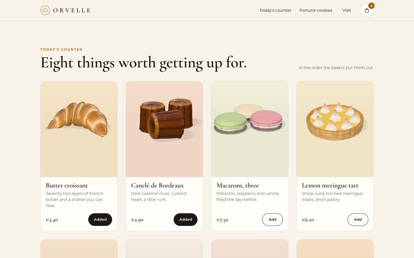 The ORVELLE counter: Eight things worth getting up for, four pastry cards with a croissant, canelés, macarons and a lemon tart, the first two marked Added and the basket in the nav showing 2.